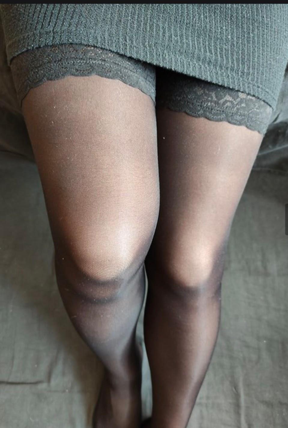 Smooth 10 denier hold ups, with a peep of stocking top.